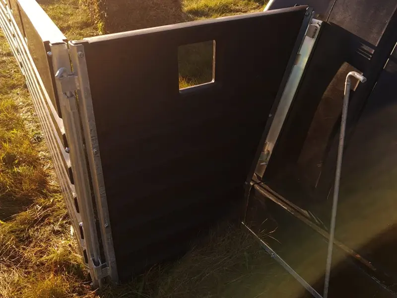 Hurdles set up with weaner hut